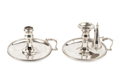 Lot 575 - A pair of George III silver chamber sticks,...