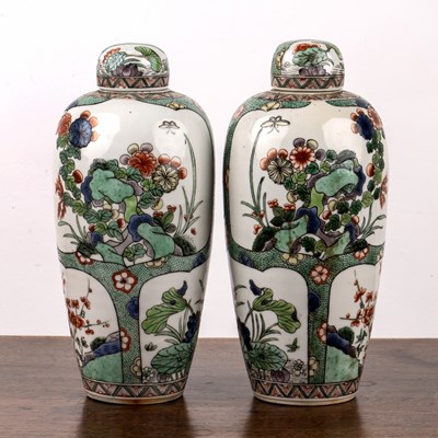 Lot 62 - Pair famille verte vases and covers Chinese,...