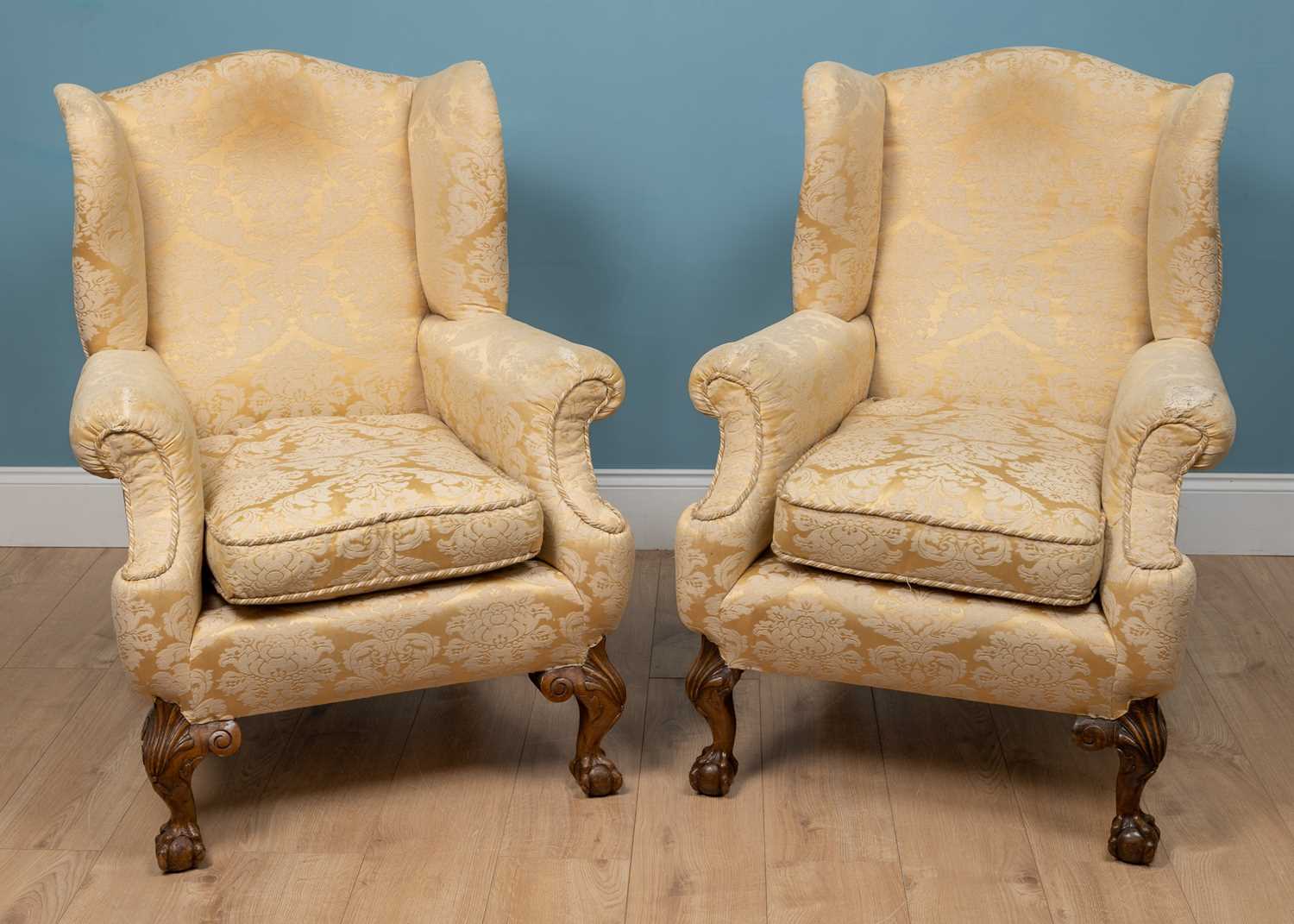 Lot 121 - A pair of 19th century wingback armchairs