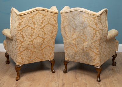 Lot 121 - A pair of 19th century wingback armchairs