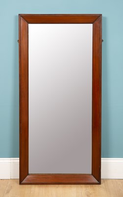 Lot 301 - A wall mirror in a mahogany frame, 134cm high...