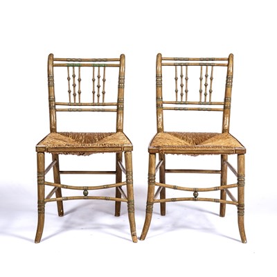Lot 83 - A pair of Regency style faux bamboo painted...