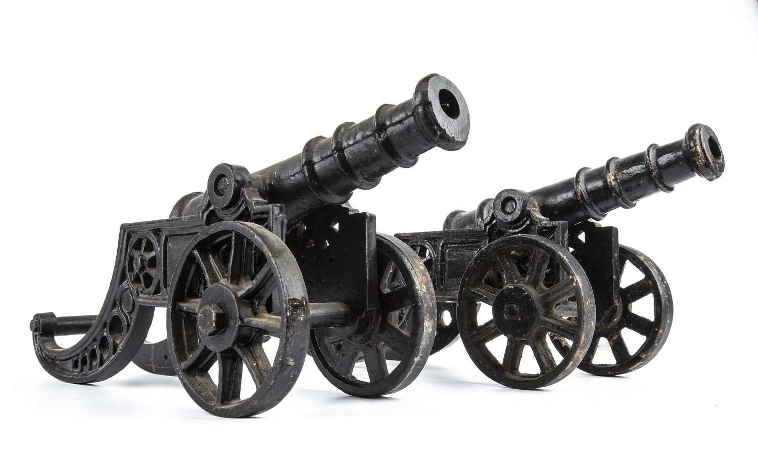 Lot 165 - A pair of cast iron desk top cannons, each...