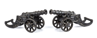 Lot 165 - A pair of cast iron desk top cannons, each...