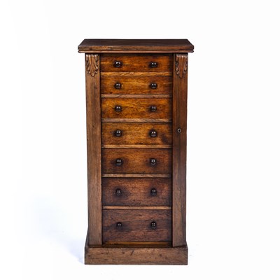 Lot 115 - A Victorian rosewood Wellington chest of seven...