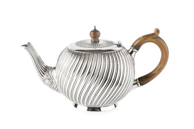 Lot 608 - A late Victorian silver teapot, of globular...