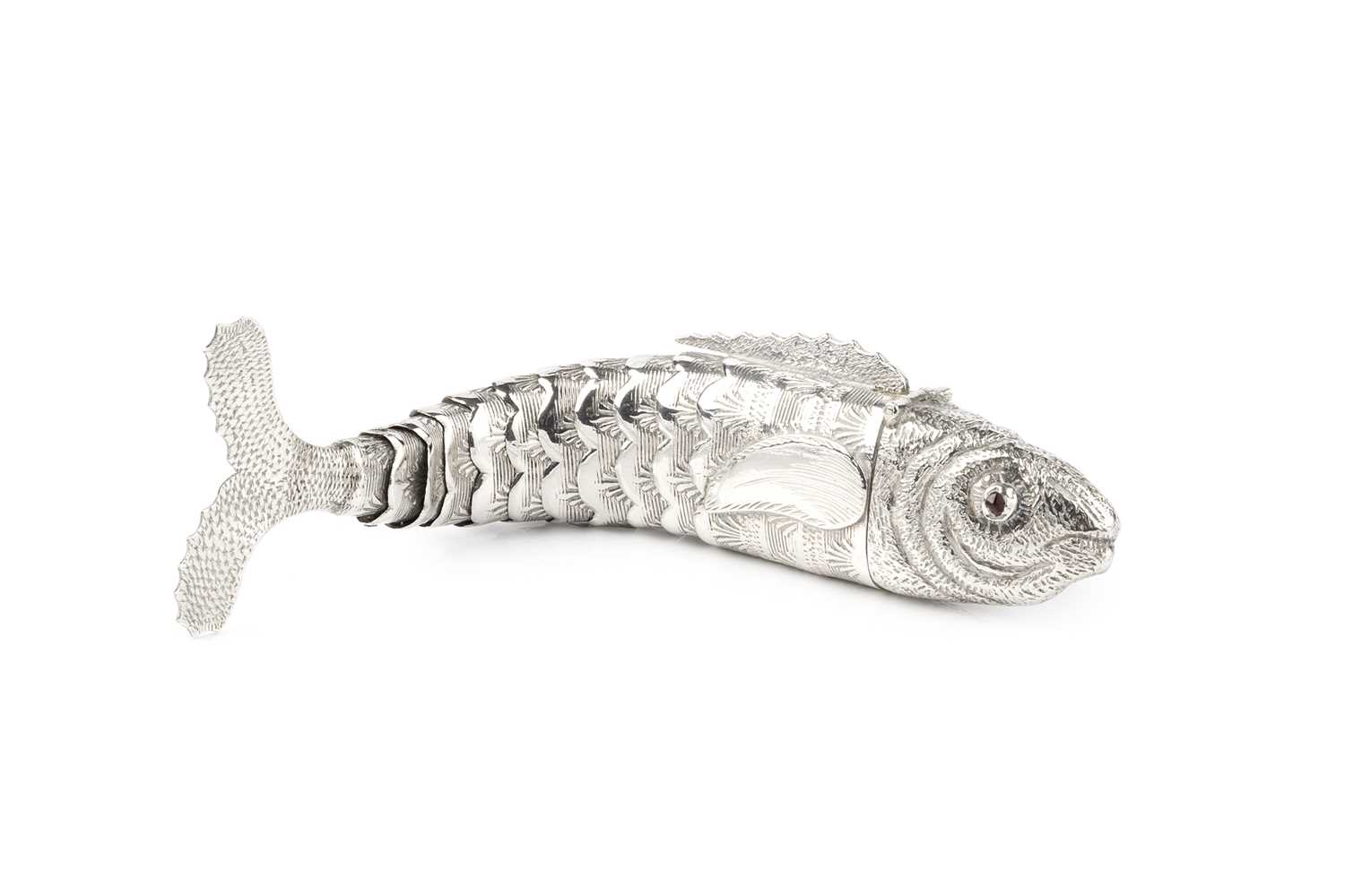 Lot 518 - A Continental silver articulated fish, the...