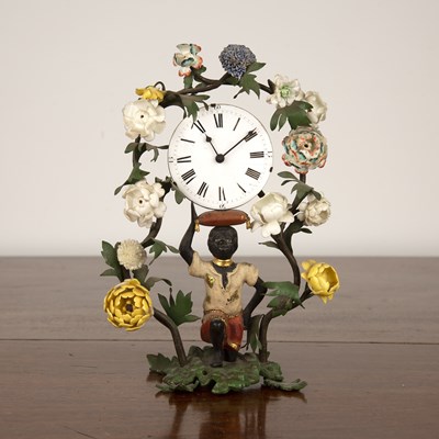 Lot 308 - Porcelain, glass and blackamoor mantel clock...