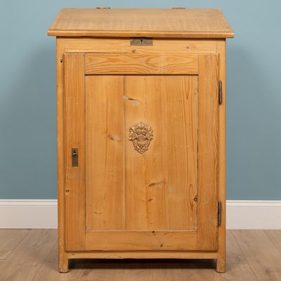 Lot 185 - A lidded pine lectern with a cabinet including...