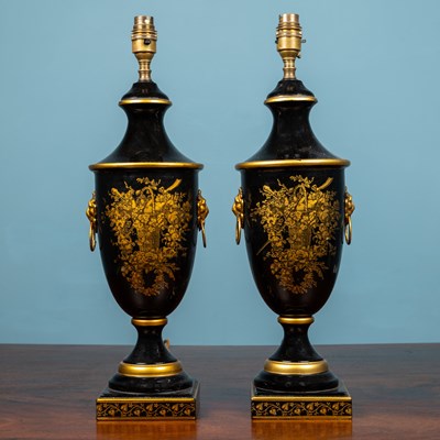 Lot 109 - A pair of toleware table lamps