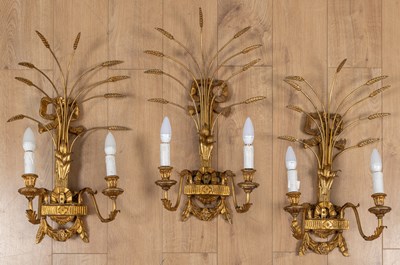 Lot 384 - A set of three contemporary gilt carved wooden toleware wall lights