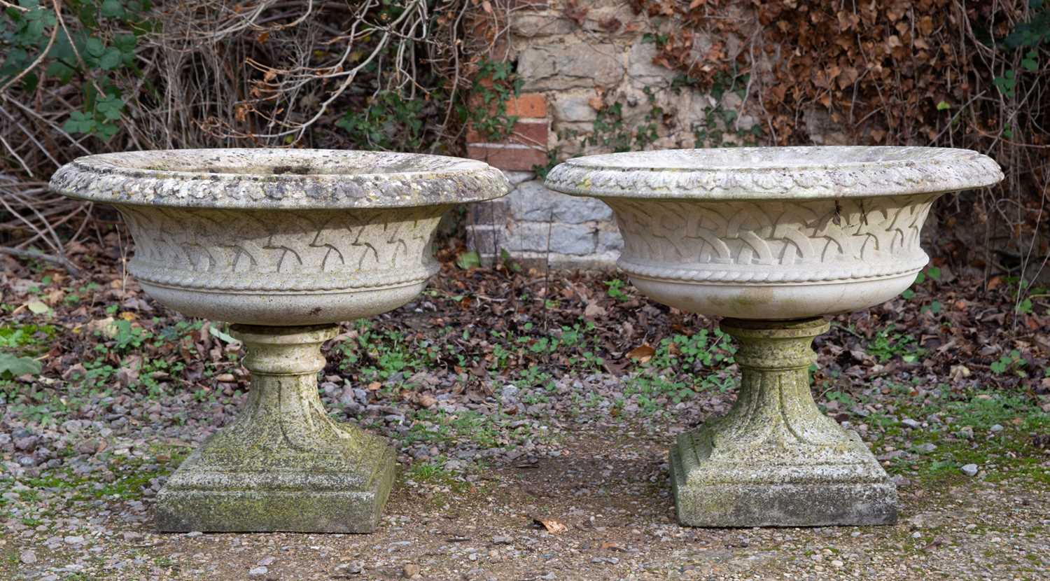 Lot 1128 - A pair of Haddonstone garden urns