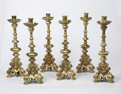 Lot 89 - A set of six heavy gilt metal candlesticks...