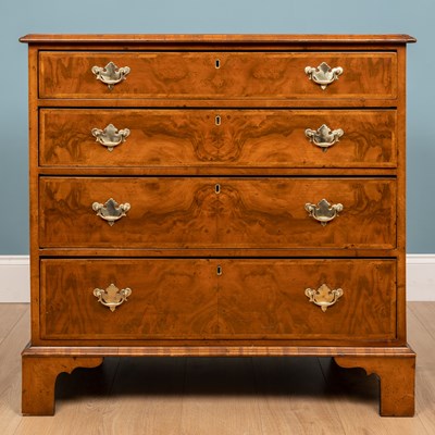 Lot 293 - A chest of drawers, walnut veneer, mahogany,...