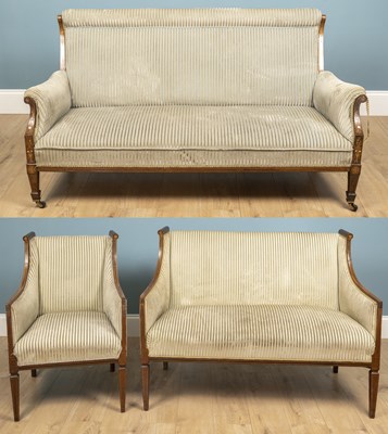 Lot 176 - An Edwardian settee with scrolling armrests on...