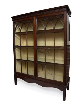 Lot 90 - A 19th century mahogany bookcase with twin...