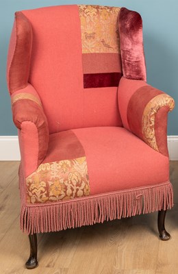 Lot 288 - A pink upholstered armchair, with a patchwork...