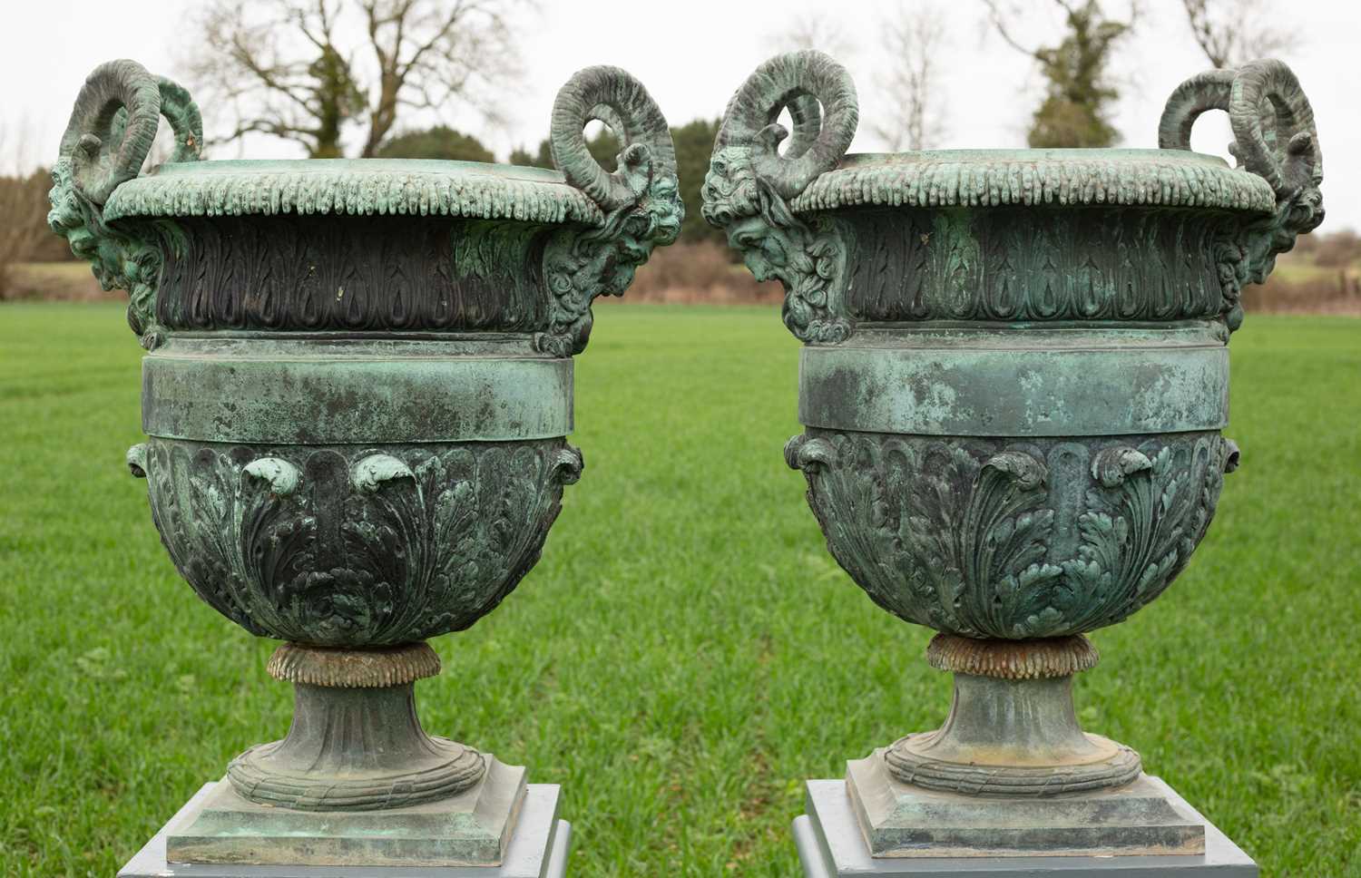 1137 - A pair of 18th or 19th century bronze urns designed by Claude Ballin