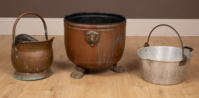 Lot 482 - A copper coal or log bucket together with an aluminium jam pan; and a copper coal scuttle