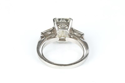 Lot 148 - A diamond single stone ring, the emerald-cut...