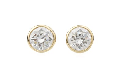 Lot 154 - A pair of diamond single stone ear studs by...