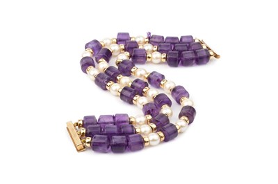 Lot 74 - An amethyst and cultured pearl matched...