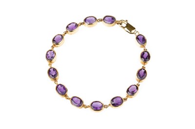 Lot 58 - An amethyst line bracelet, designed as a...