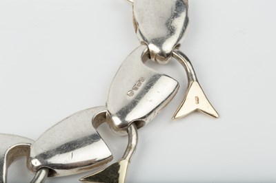 Lot 657 - Brett Payne Silver and 9ct gold fish-link...