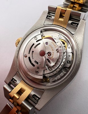 Lot 188 - A lady's stainless steel and yellow gold...