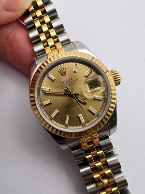 Lot 188 - A lady's stainless steel and yellow gold...