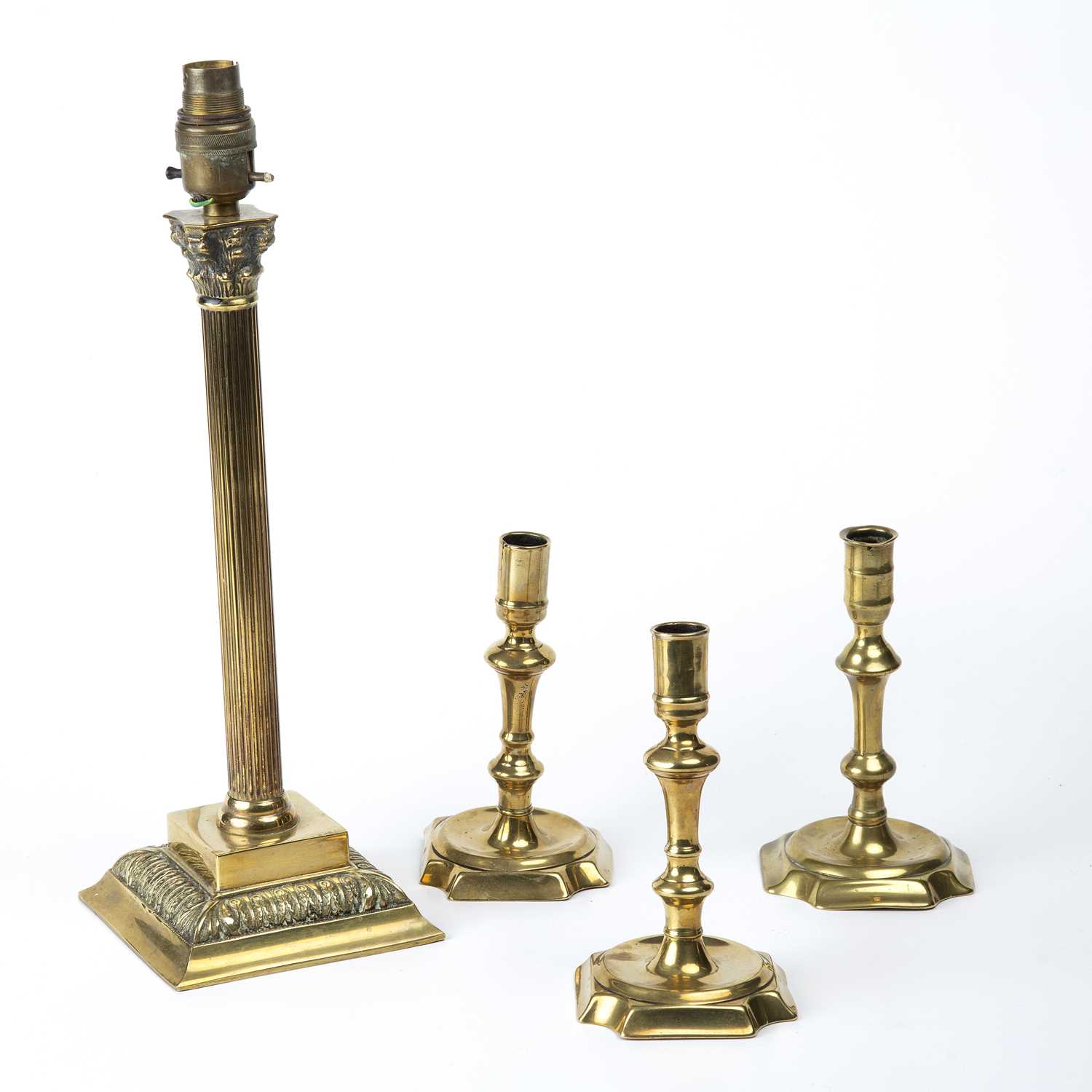 Lot 99 - Three early 18th century English brass...