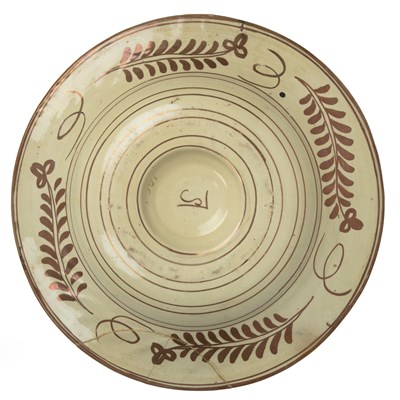 Lot 202 - An antique Hispano Moresque copper lustre...