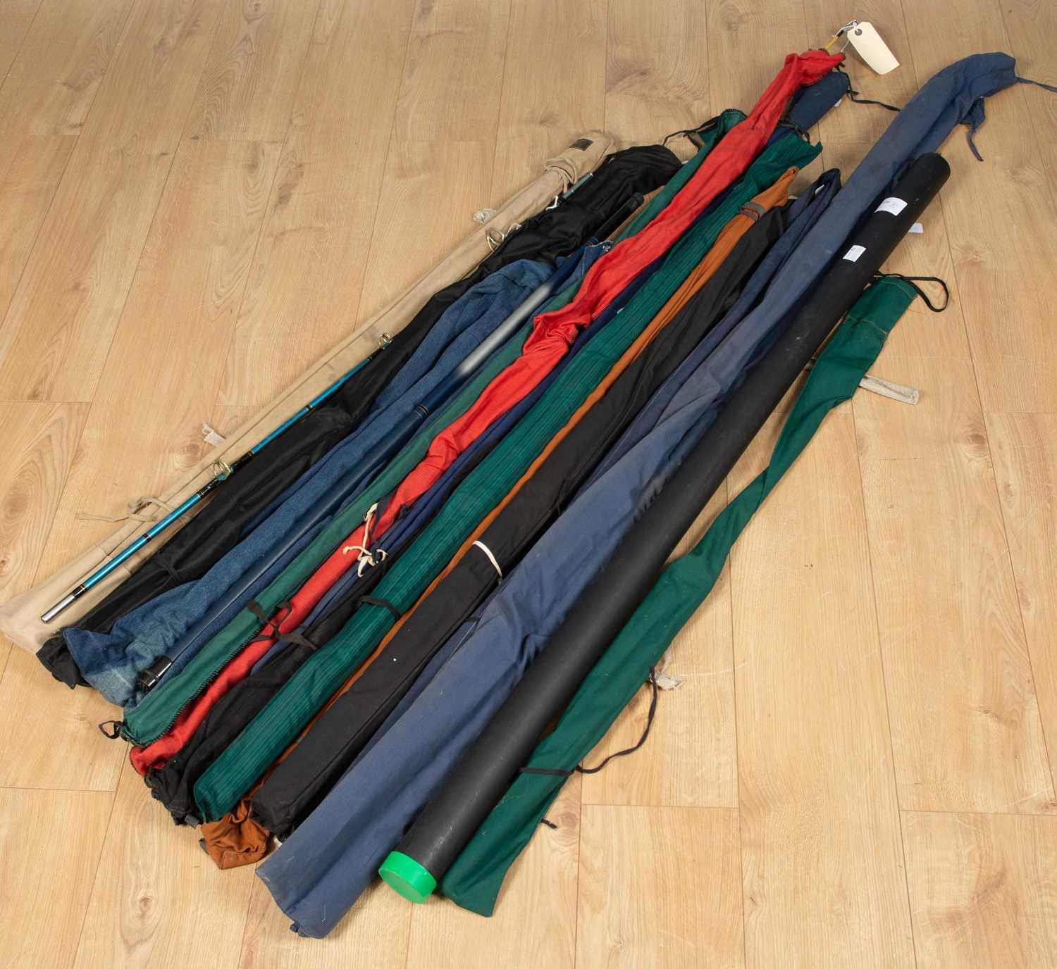 Lot 91 - A collection of fishing rods to include: a
