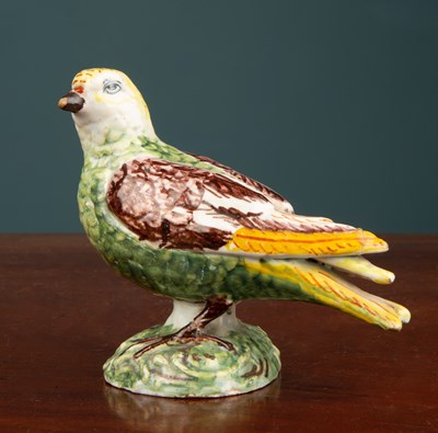 Lot 313 - An 18th century Dutch Delft model of a bird