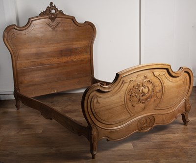 Lot 79 - Walnut carved double bedstead French, late...