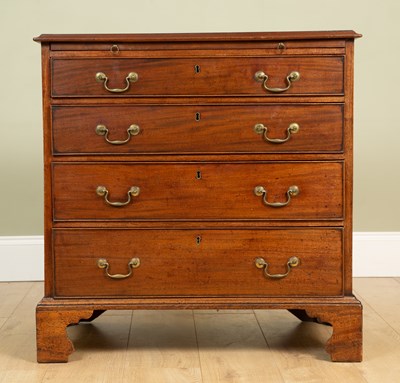 Lot 287 - A small Georgian mahogany chest with brushing...