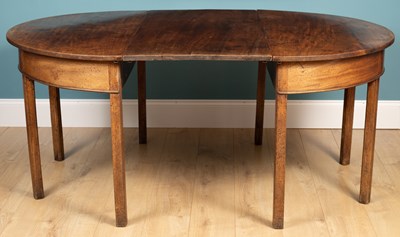 Lot 495 - A Georgian mahogany D-end dining table