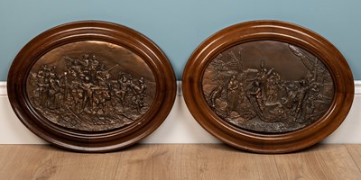 Lot 33 - A pair of oval continental copper relief...