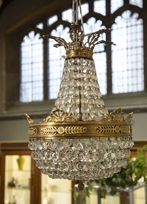 Lot 29 - Glass and gilt metal classical-style...