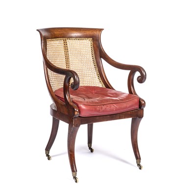 Lot 286 - A Regency mahogany bergere library open...