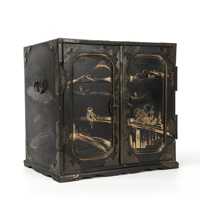 Lot 311 - An antique Japanese lacquered table cabinet...