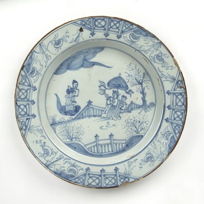 Lot 336 - An 18th century English delft ware charger...