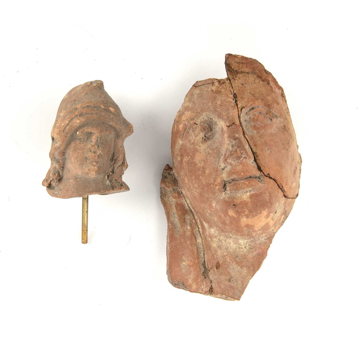 Lot 337 - An ancient Greek terracotta head possibly...