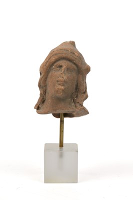 Lot 337 - An ancient Greek terracotta head possibly...