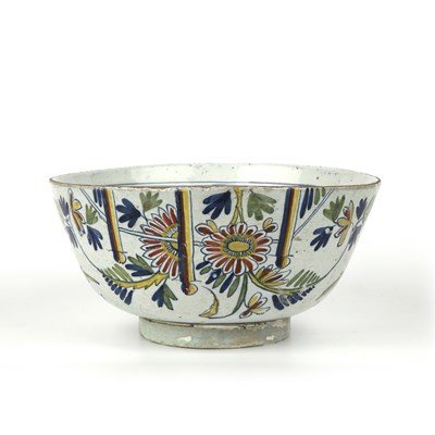 Lot 339 - An 18th century English delft punch bowl,...