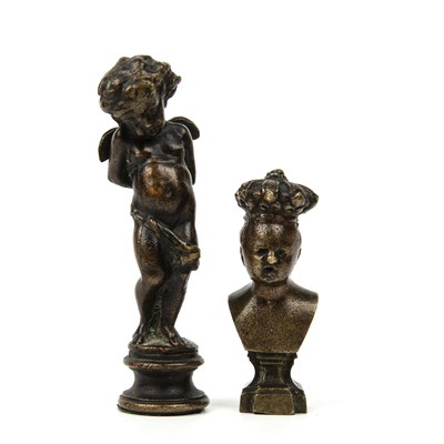 Lot 346 - An antique bronze cherub, 10.5cm in height and...