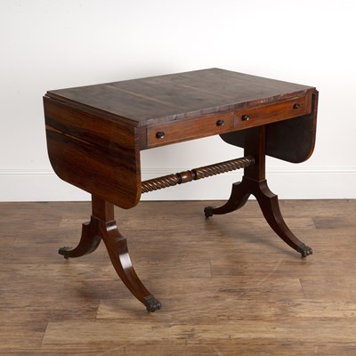 Lot 110 - Rosewood veneered and mahogany sofa table in...