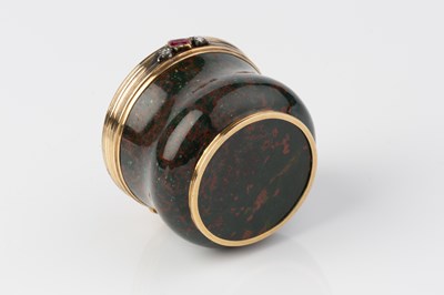 Lot 519 - An antique gold mounted bloodstone circular...