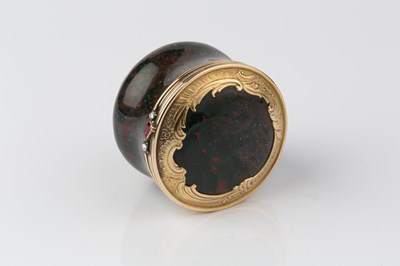 Lot 519 - An antique gold mounted bloodstone circular...