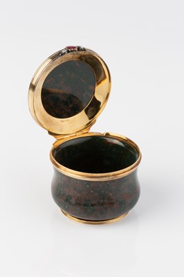 Lot 519 - An antique gold mounted bloodstone circular...